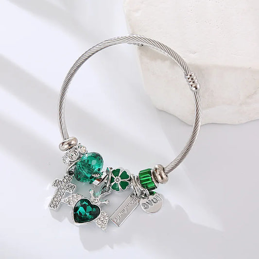 Pulsera Cruz Corazón Alas Verde